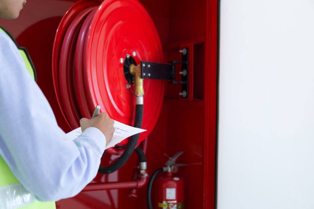 Engineer inspection Fire extinguisher and fire hose.